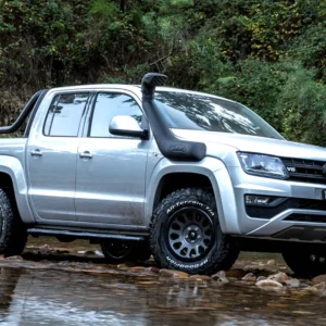 Safari SS1400HF V-Spec snorkel fitted to Volkswagen Amarok driving through shallow water.