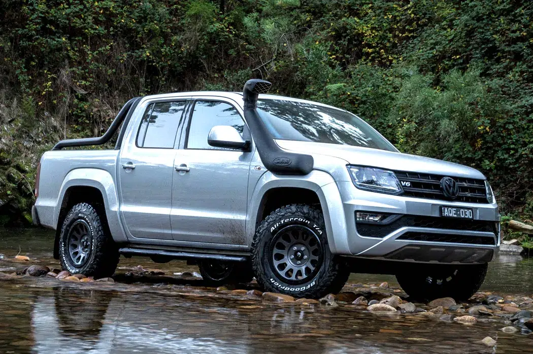 Safari SS1400HF > 4wd Lights and Camping Online Store Safari SS1400HF V-Spec snorkel fitted to Volkswagen Amarok driving through shallow water.
