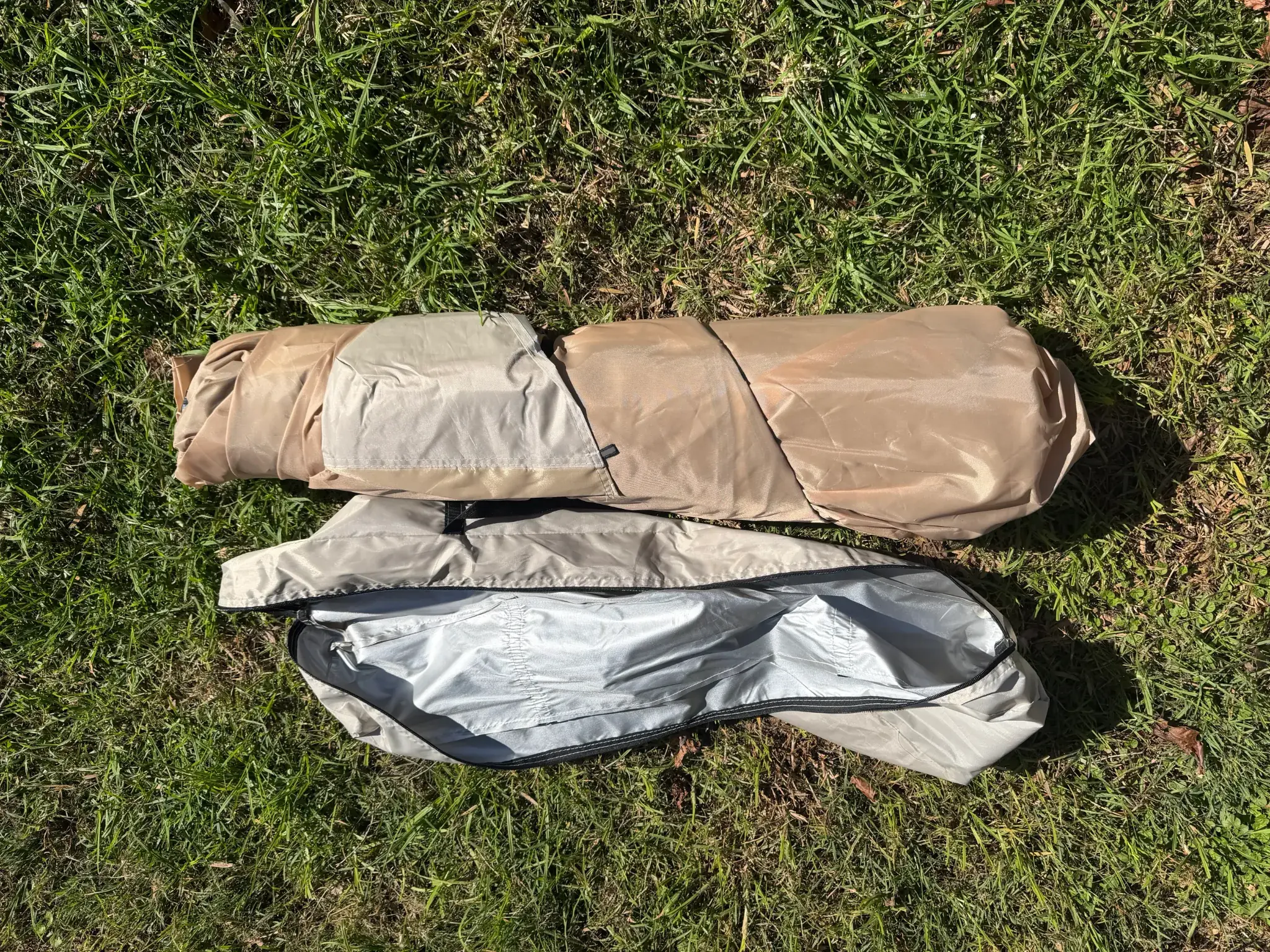 4 person camping tent packed into carry bag with storage bag and accessories